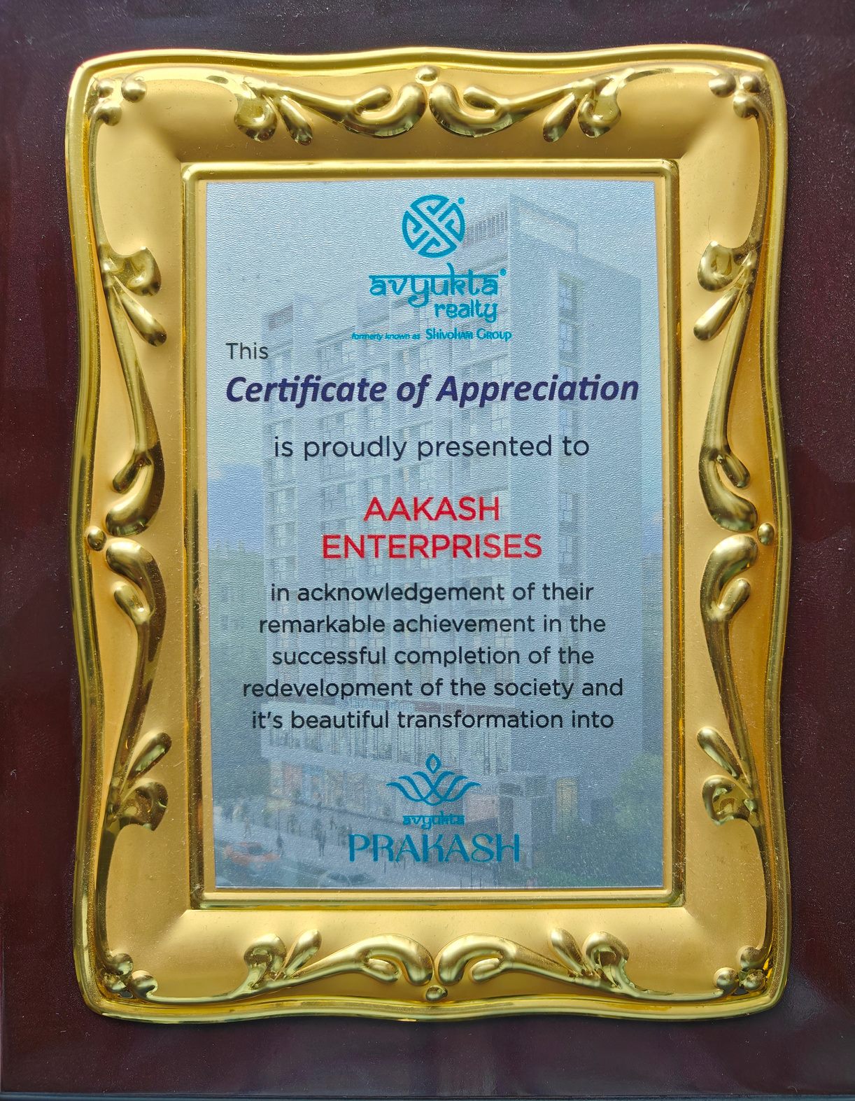 Certificate of Appreciation presented to Aakash Enterprises by Avyukta Realty for completing the redevelopment now called Avyukta Prakash.